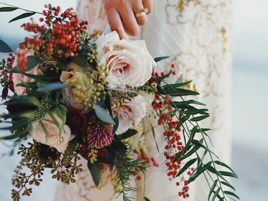 Bride holding a floral bouquet