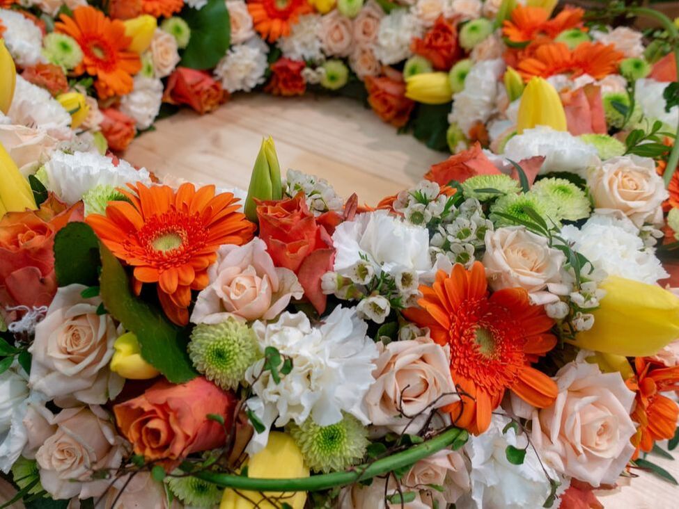 Casket cover floral arrangement